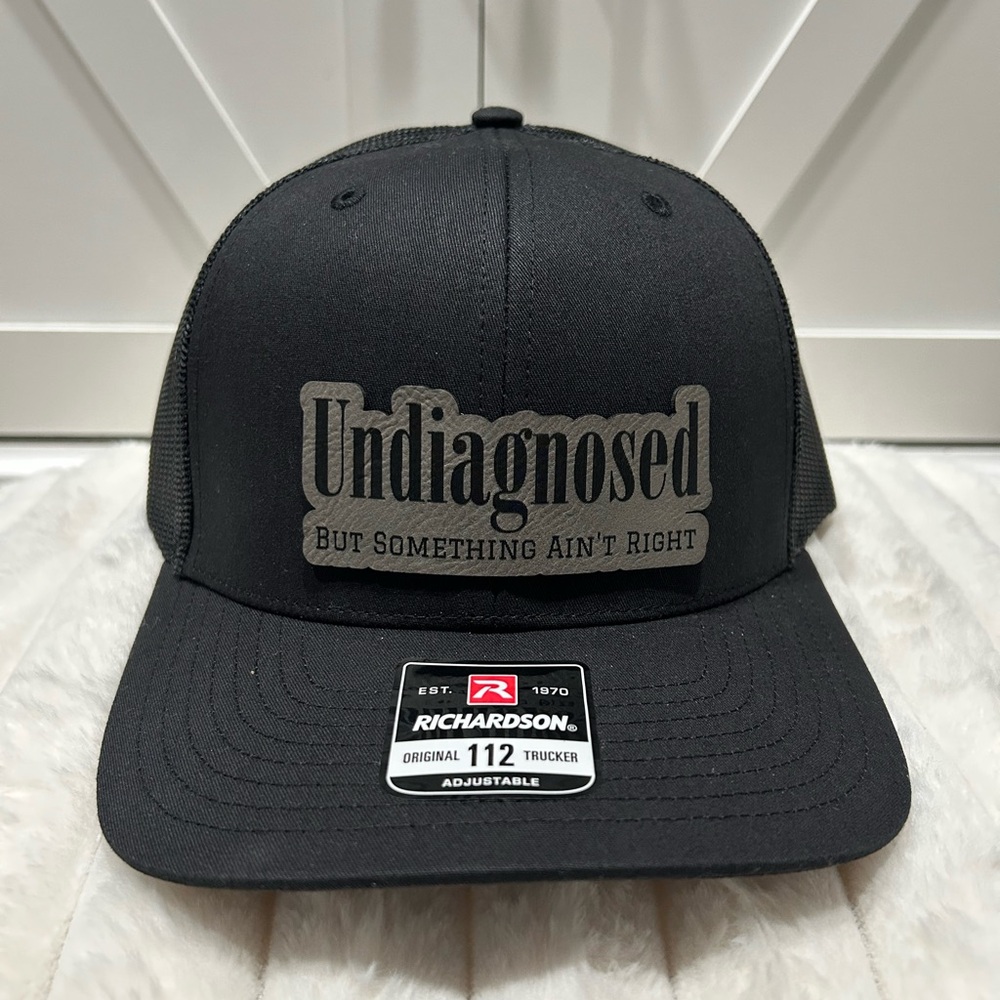 Undiagnosed, but something ain’t right. Laser engraved Richardson Hat.
